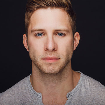 Headshot of Corey Mach